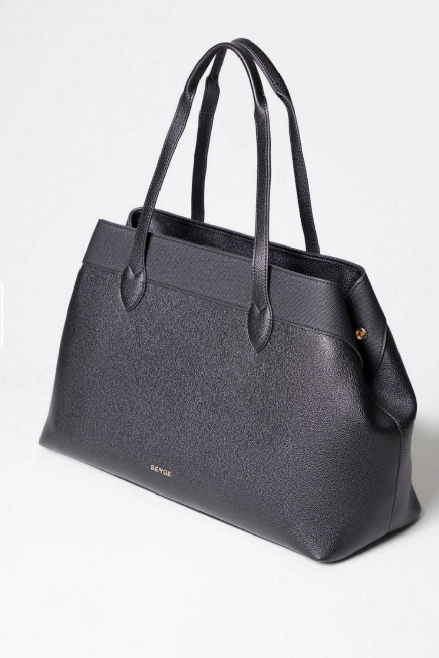 Gray handbag with a visible brand name on a white background